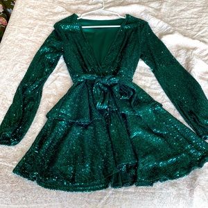 Long sleeve, low cut, green sparkly dress